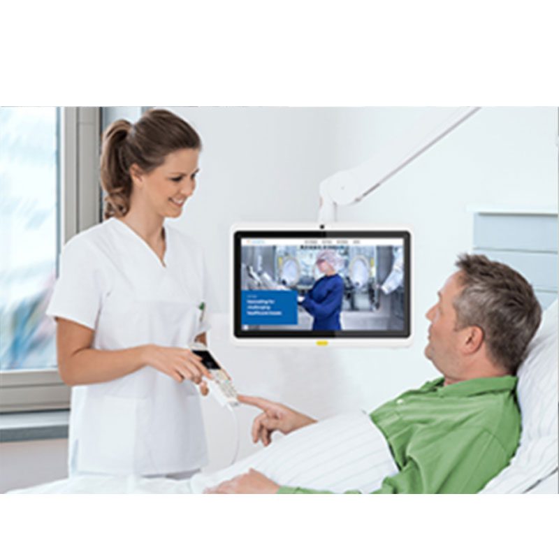 A nurse is talking to a patient using the GK-WH133-RK3288-A8.1-DS/TM 13.3" Android PoE Tablet for Telemedicine and Digital Signage in a hospital bed. A nurse is talking to a patient using the GK-WH133-RK3288-A8.1-DS/TM 13.3" Android PoE Tablet for Telemedicine and Digital Signage in a hospital bed.