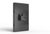 The back of a black phone with a camera attached to it. The back of a black phone with a camera attached to it.