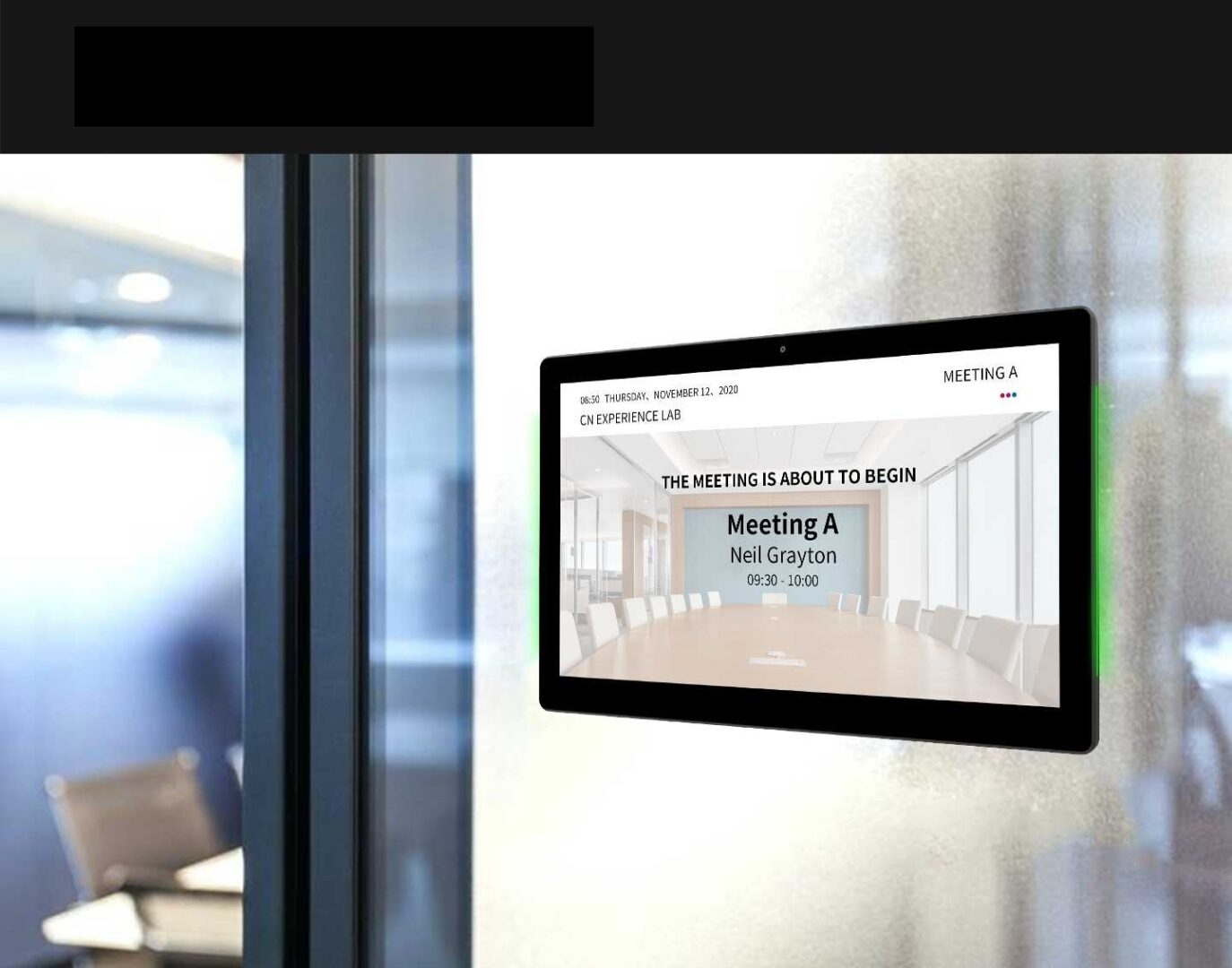 A GK-1052PL-MR 10" Android POE Wall Mount Meeting Room Display w LED status bar (Optional Meeting Room App) is displayed on a wall in a conference room. A GK-1052PL-MR 10" Android POE Wall Mount Meeting Room Display w LED status bar (Optional Meeting Room App) is displayed on a wall in a conference room.