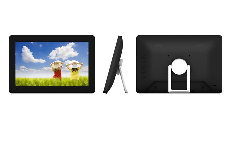 A digital photo frame with a picture of a girl and a boy. A digital photo frame with a picture of a girl and a boy.