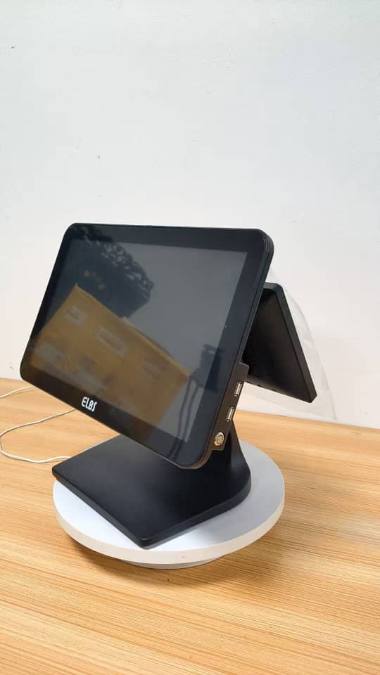 Touchscreen display on wooden surface. Touchscreen display on wooden surface.